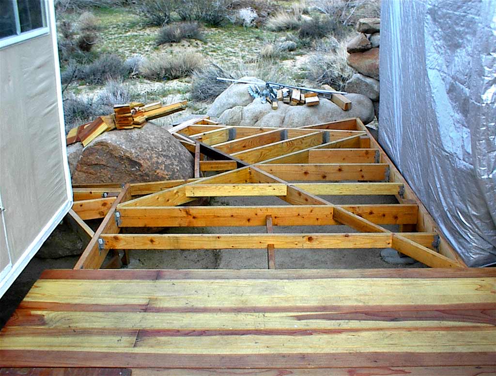 A trailer support rack and a deck