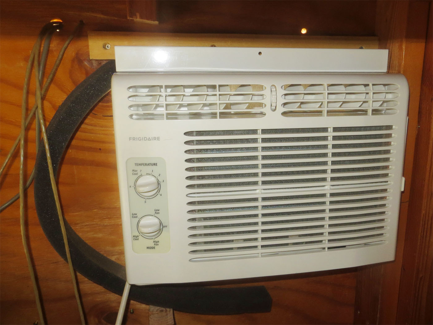 Stuffing Included Insulation Around Frigidaire Window Air Conditioner In Wall Hole