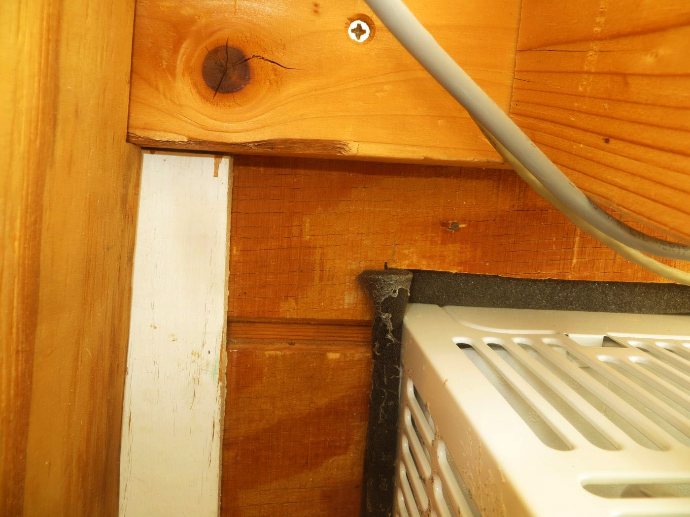 Stuffing Included Insulation Around Frigidaire Window Air Conditioner