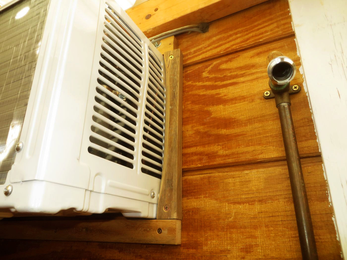 Outside Framing Air Conditioner To Lock In Insulation