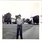 Me with 2 CES buildings in the background