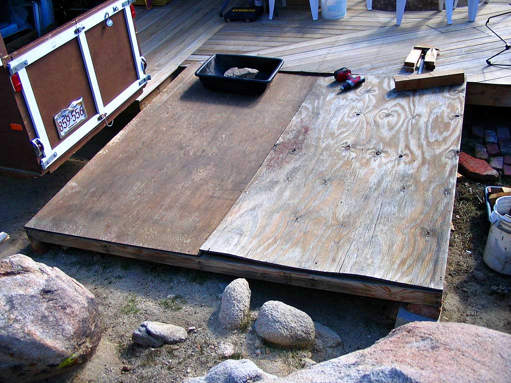 Disassembling the old tent base