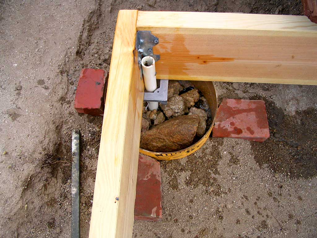 The sono tube is partially filled with wet rock.