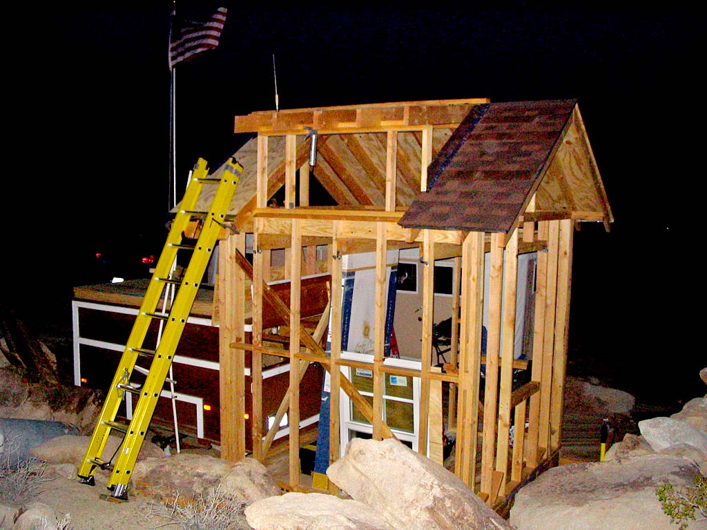 The flashing will keep the rain from seeping under the sides of the dormer