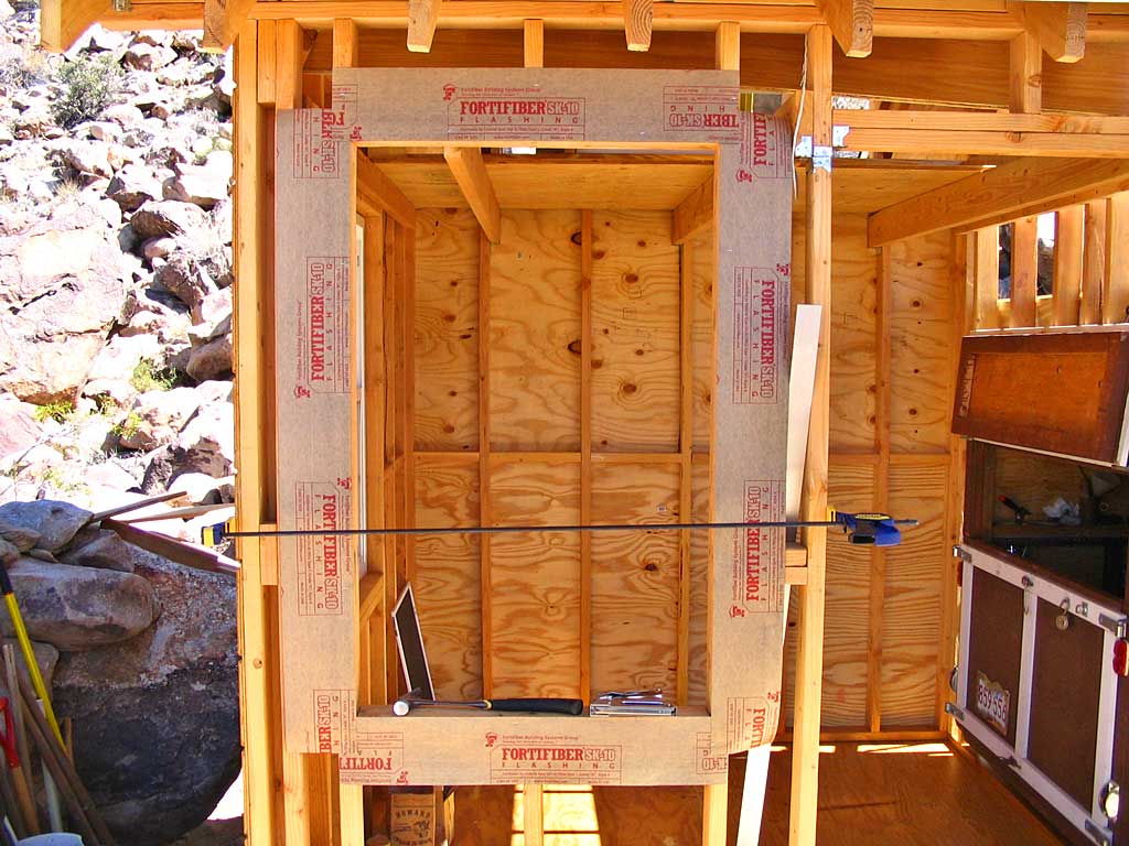 Stapled flashing to the window jamb