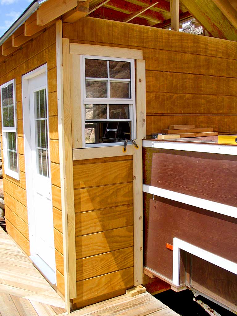 Fitting trim pieces to south window and box trailer