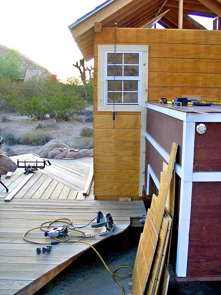 Fitting the trim around the south window and the box trailer