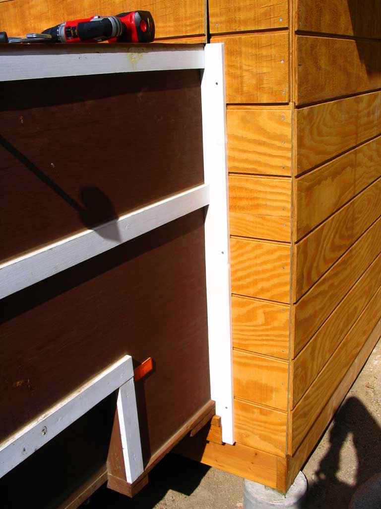 Though screwed only to the shed, the trim was heavily caulked