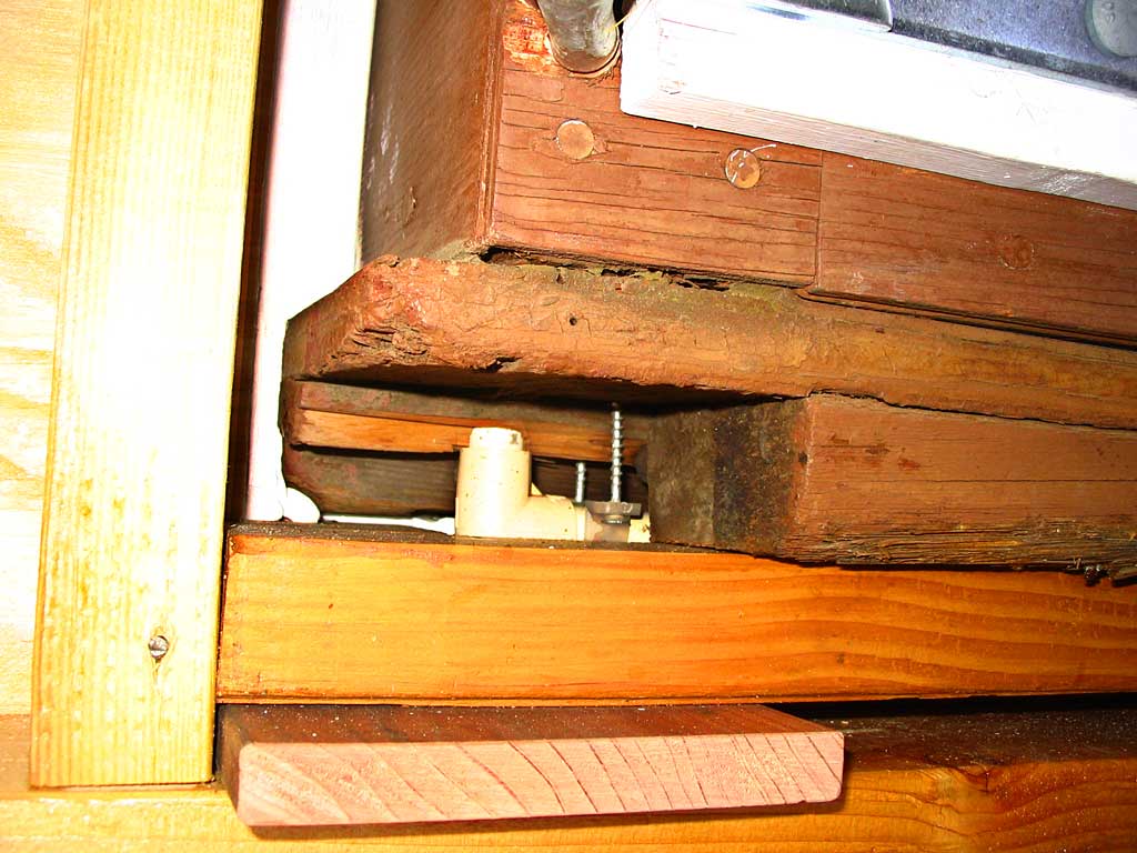 The trailer trim where it meets the sill inside