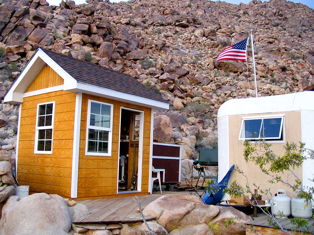 A view of the shed, deck and trailers from the wash
