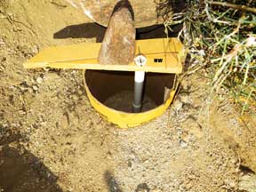 forming a post Hole for the northwest corner of the shed platform