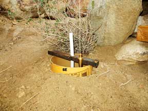 forming a post Hole for the southeast corner of the shed platform