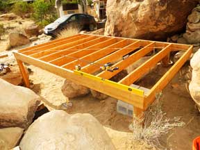 The four corner posts of the shed platform are done