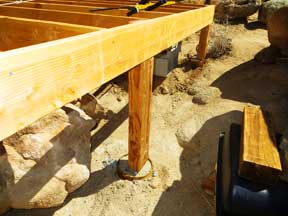 the south center post connects the shed platform frame two its concrete pier