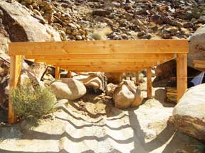 All six posts of the shed platform are firmly attached to their concrete piers