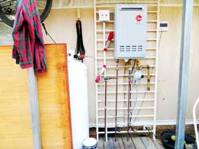 A Rheem Tankless Water Heater And GFCI Outlets