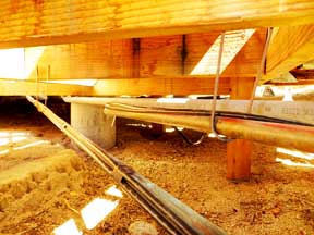 Securing Heat Tape Against Pipe With Silicone Tape