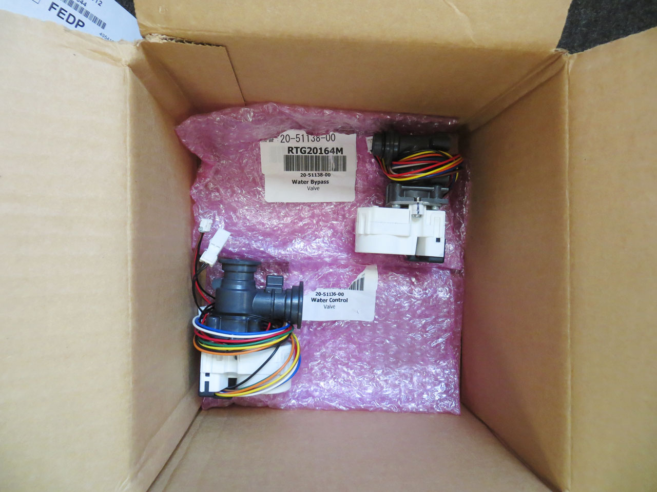 A Water Bypass Valve And A Water Control Valve From Rheem