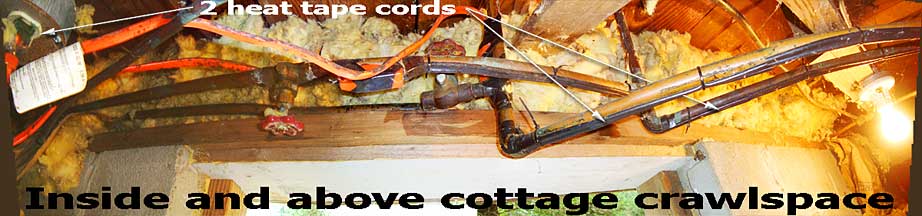 The pipes and heat tapes above the crawlspace entry