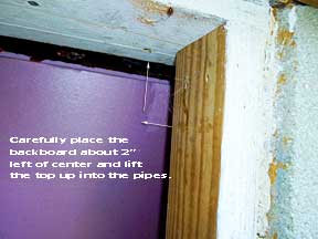 Installing the inside backboard of the cottage crawlspace insulating block