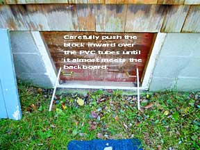 Installing the cottage crawlspace insulating block